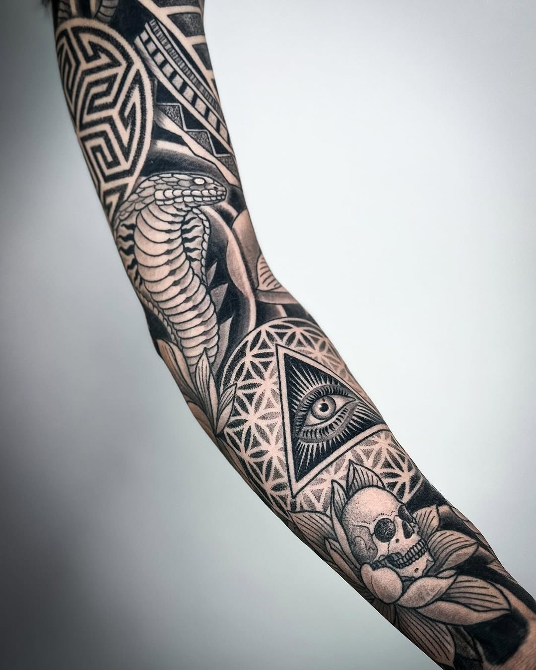 Intricate Egyptian-Inspired Tattoo Sleeve Design Tattoo on skin