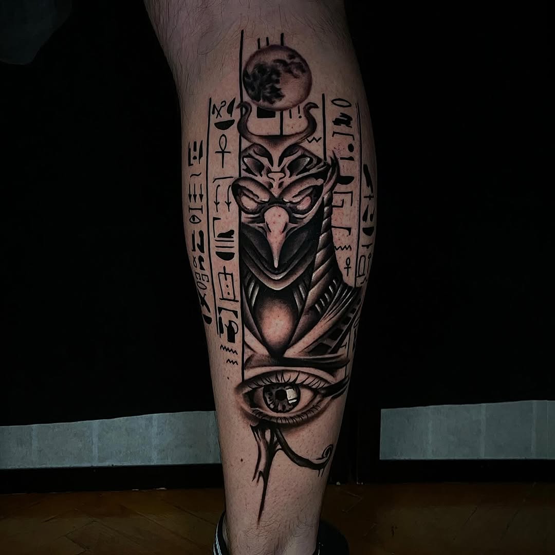 Intricate Egyptian tattoo featuring the Eye of Horus Tattoo on skin
