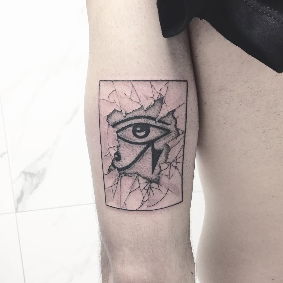 Intriguing cracked skin Egyptian eye tattoo Tattoo on skin