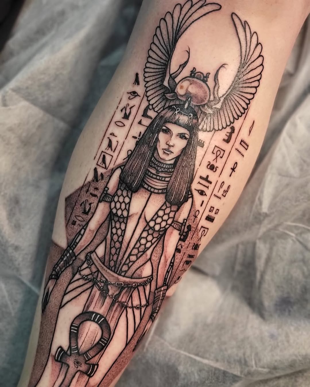 Stunning Egyptian Goddess Tattoo With Scarab Tattoo on skin