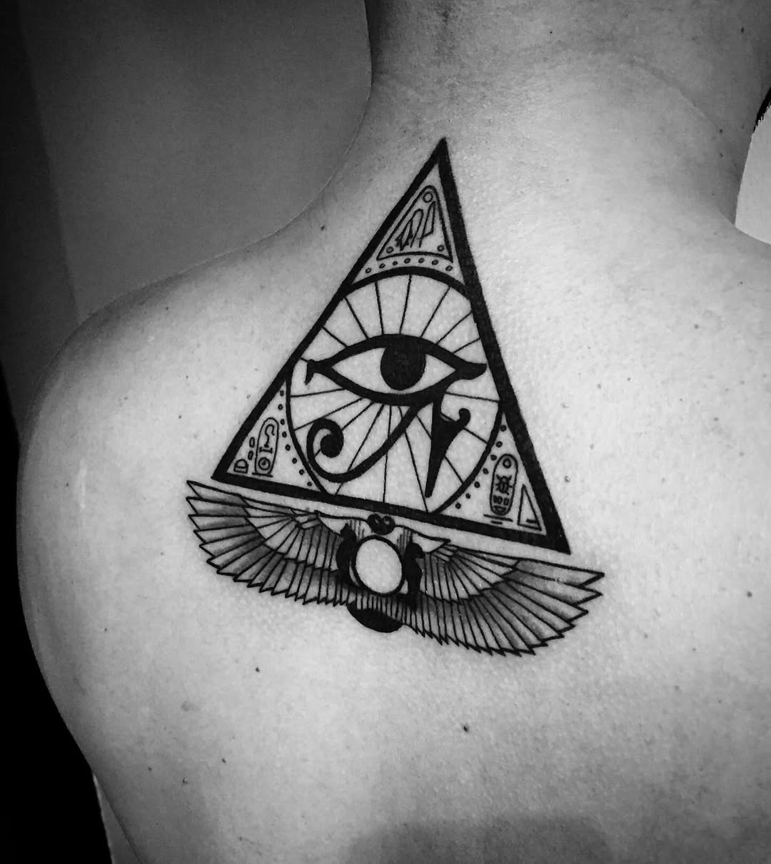 Symbolic Egyptian Eye Tattoo on Back Tattoo on skin