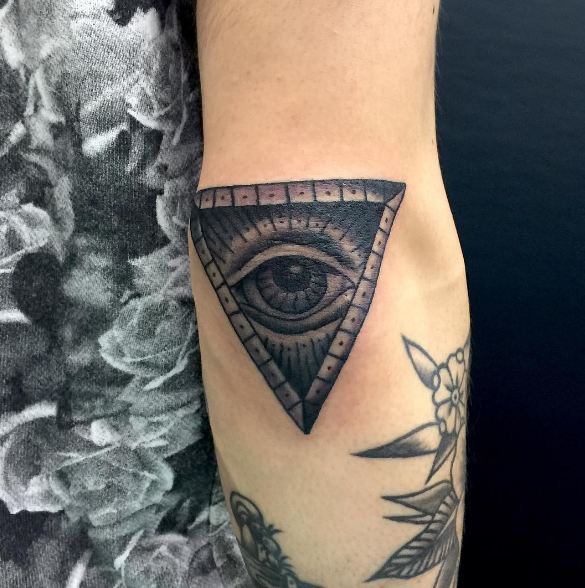 All-Seeing Eye on Elbow Tattoo Tattoo on skin