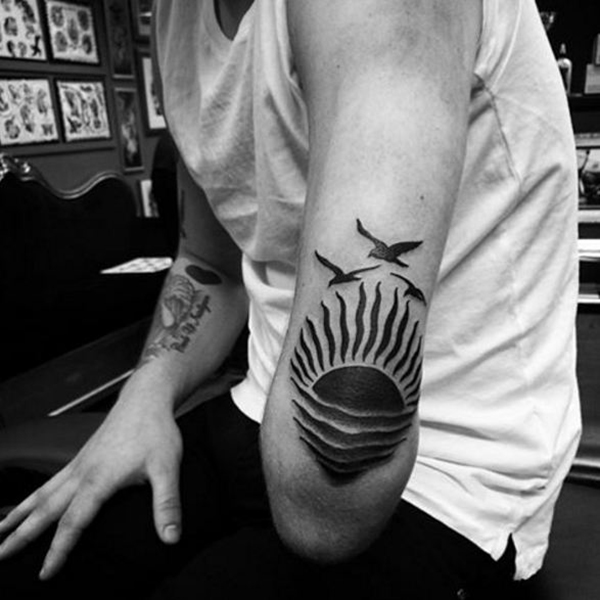 Birds Flying Over Ocean Sunset Elbow Tattoo Ideas Tattoo on skin