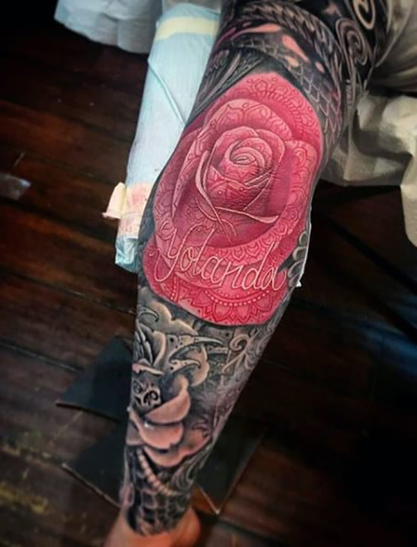 Intricate Patterned Rose with Name Elbow Tattoo Tattoo on skin