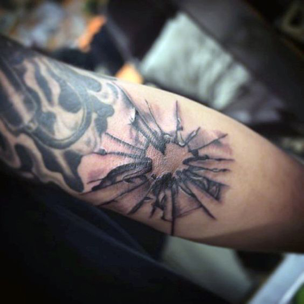 Shattered Glass Centered on Elbow Tattoo Tattoo on skin