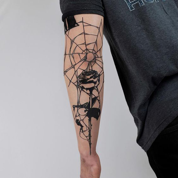 Spider Web Melds with Rose Elbow Tattoo Tattoo on skin
