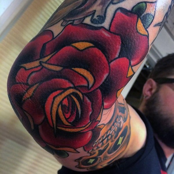 Traditional Style Red Rose Elbow Tattoo Tattoo on skin