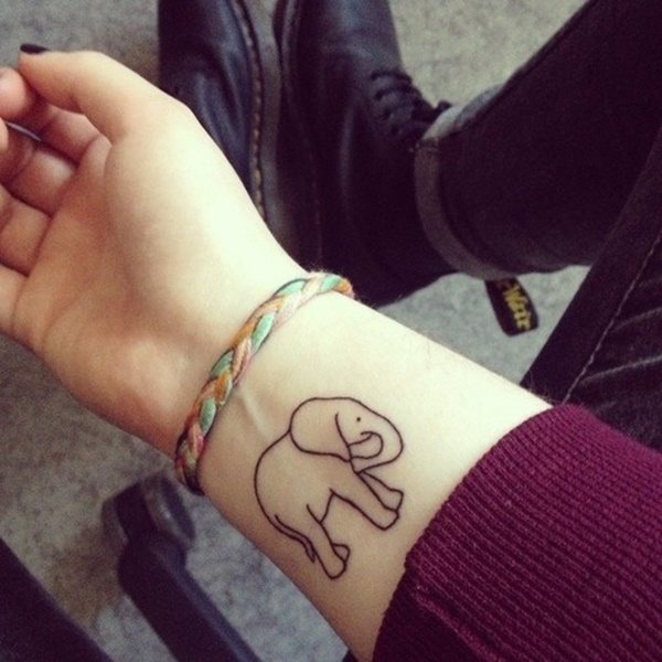 Clean Line-Art Baby Elephant Inner Wrist Tattoo Tattoo on skin