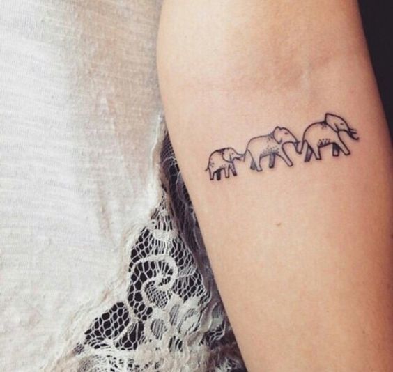 Minimalist Elephant Family March Arm Tattoo Tattoo on skin