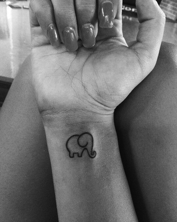 Minimalist Single-Stroke Elephant Outline Wrist Tattoo Tattoo on skin