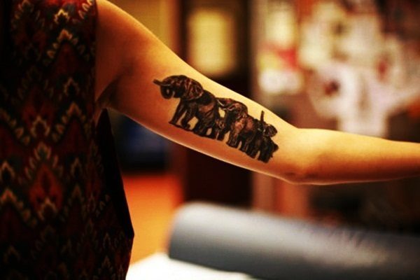 Realistic Elephant Herd Marching Inner Bicep Tattoo Tattoo on skin