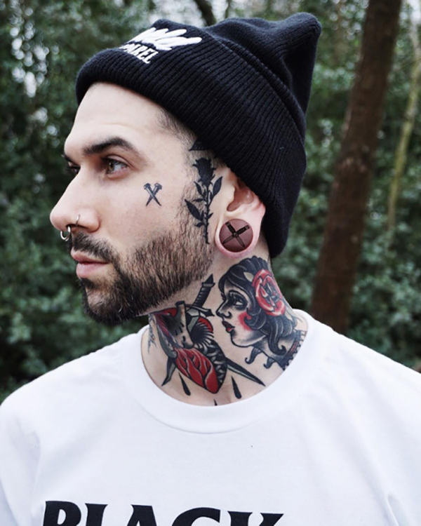Crossed Stakes Black Rose Face Tattoos Tattoo on skin