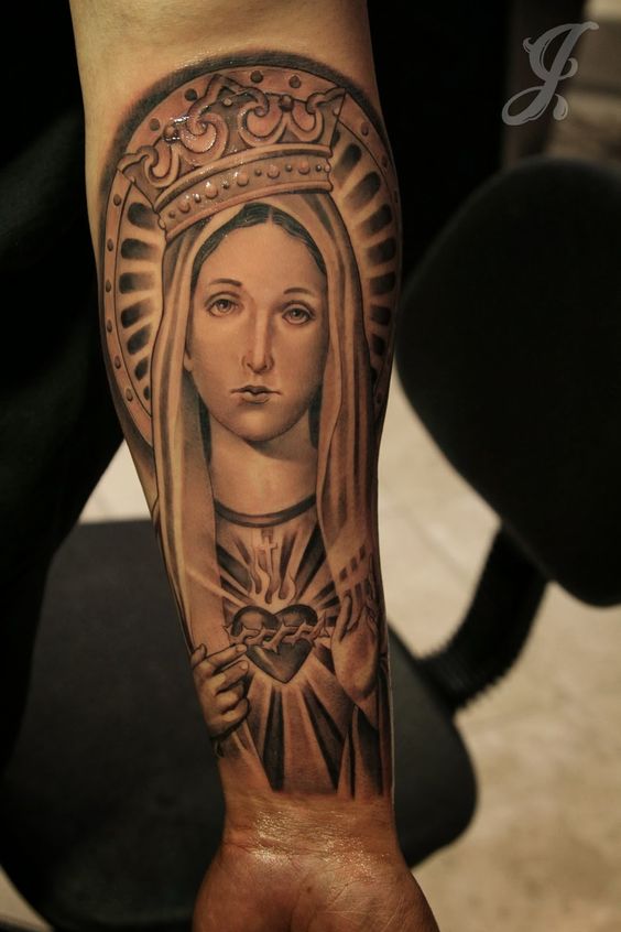 Mother Mary and Faithful Symbols Tattoo Design Tattoo on skin
