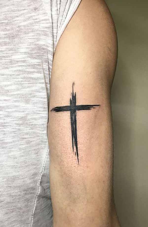 Sketched Out Solid Black Cross Tattoo Design Tattoo on skin