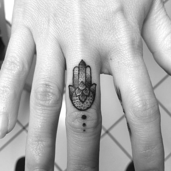 Abstract Floral Finger Tattoo Tattoo on skin