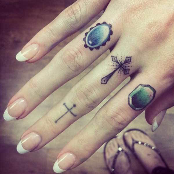 Crosses and Jewels Finger Tattoo Ideas Tattoo on skin