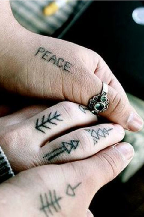 Native American Finger Tattoo Tattoo on skin