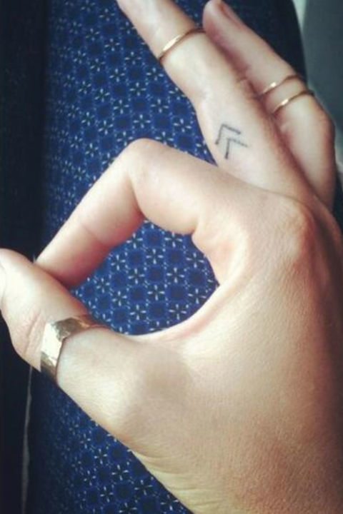Simple Arrows Finger Tattoo Tattoo on skin