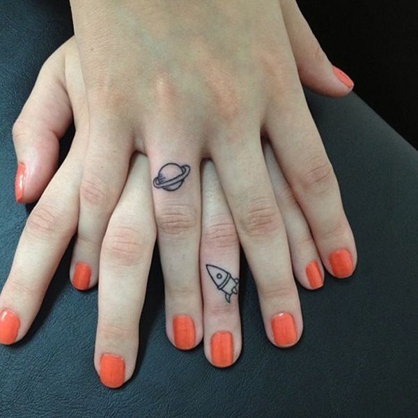 Space Finger Tattoo Tattoo on skin