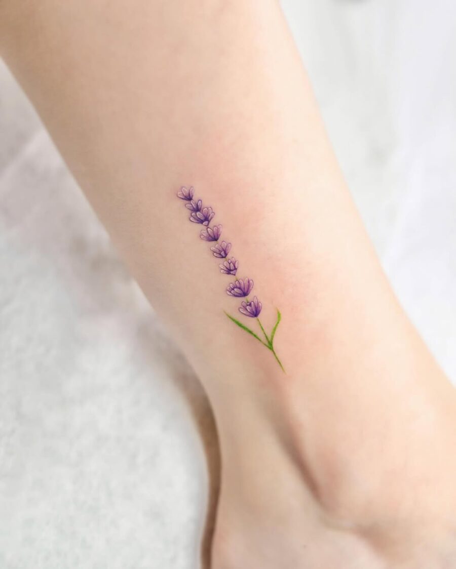 Delicate lavender tattoo accentuating the ankle Tattoo on skin
