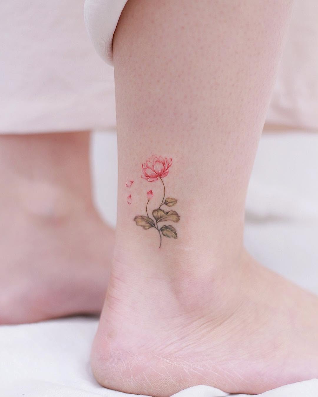Delicate pink rose ankle tattoo design Tattoo on skin