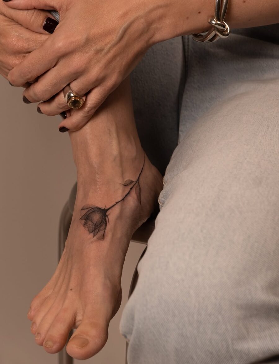 Stunning floral ankle tattoo for a graceful touch Tattoo on skin