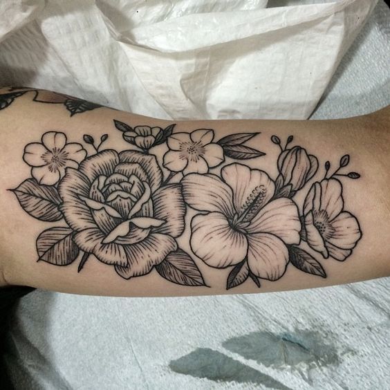 Plain and Simple Flower Tattoos Tattoo on skin