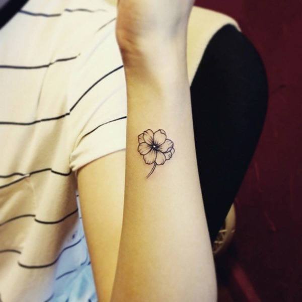 Small Flower Tattoo Tattoo on skin