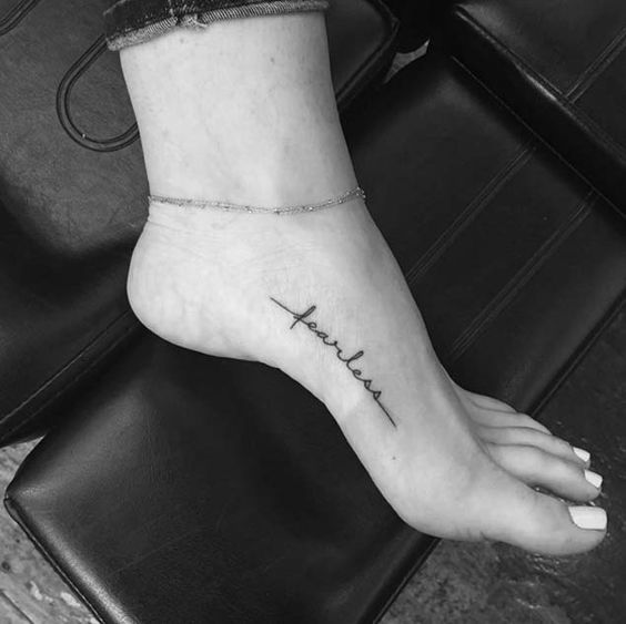 foot tattoo by tattoo artist Tattoo on skin