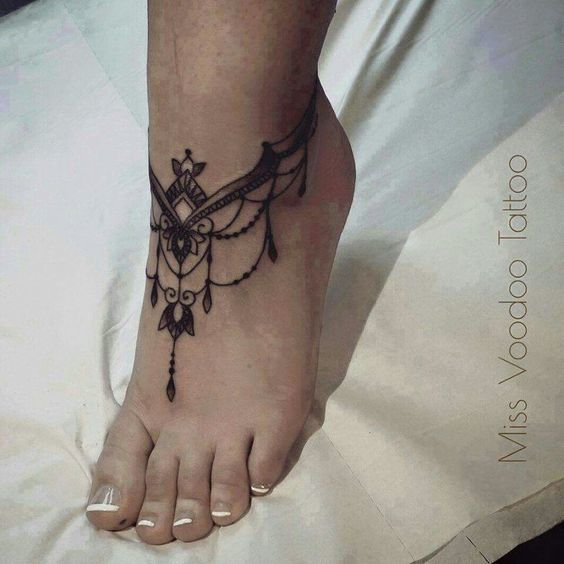 foot tattoo, tribal art Tattoo on skin