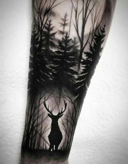 Dramatic Buck Silhouette in the Woods forearm tattoo Tattoo on skin