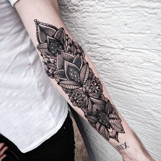 Intricate Patterns with Florals and Leaves Forearm Tattoos Tattoo on skin