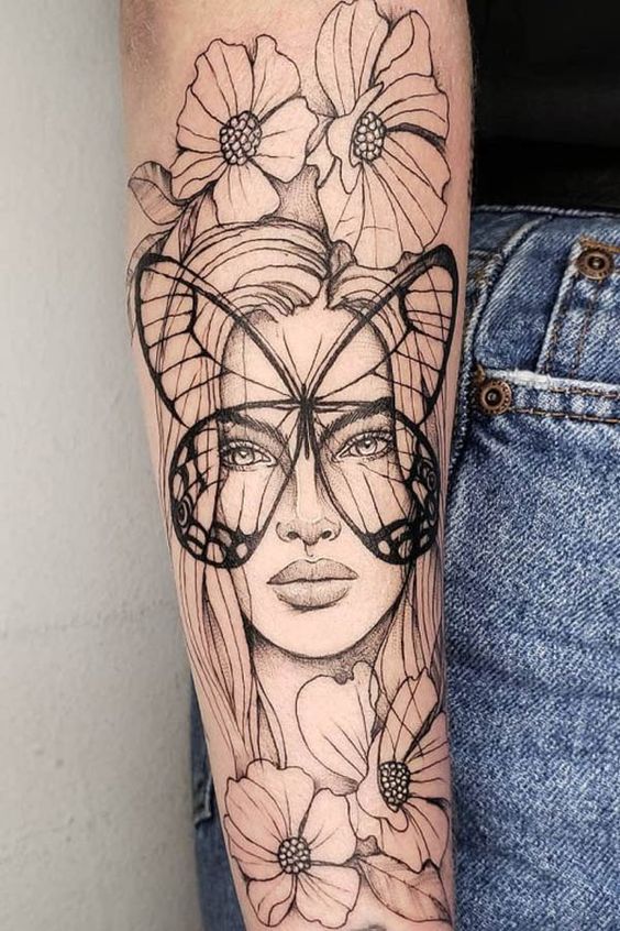 Woman with a Butterfly Mask Meaningful Tattoo Tattoo on skin
