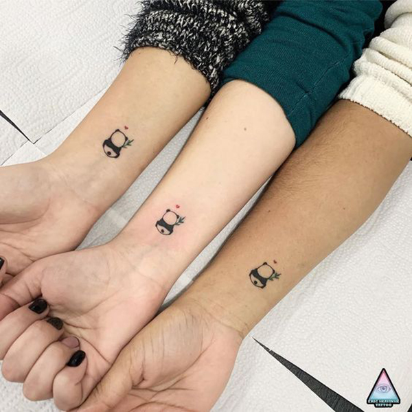 Adorable Backwards Pandas Holding Bamboo Friend Tattoo Ideas Tattoo on skin