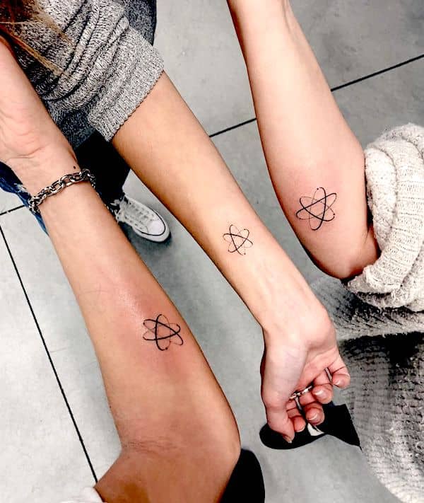 Matching Atomic Model Arm Tattoos friendship tattoos
