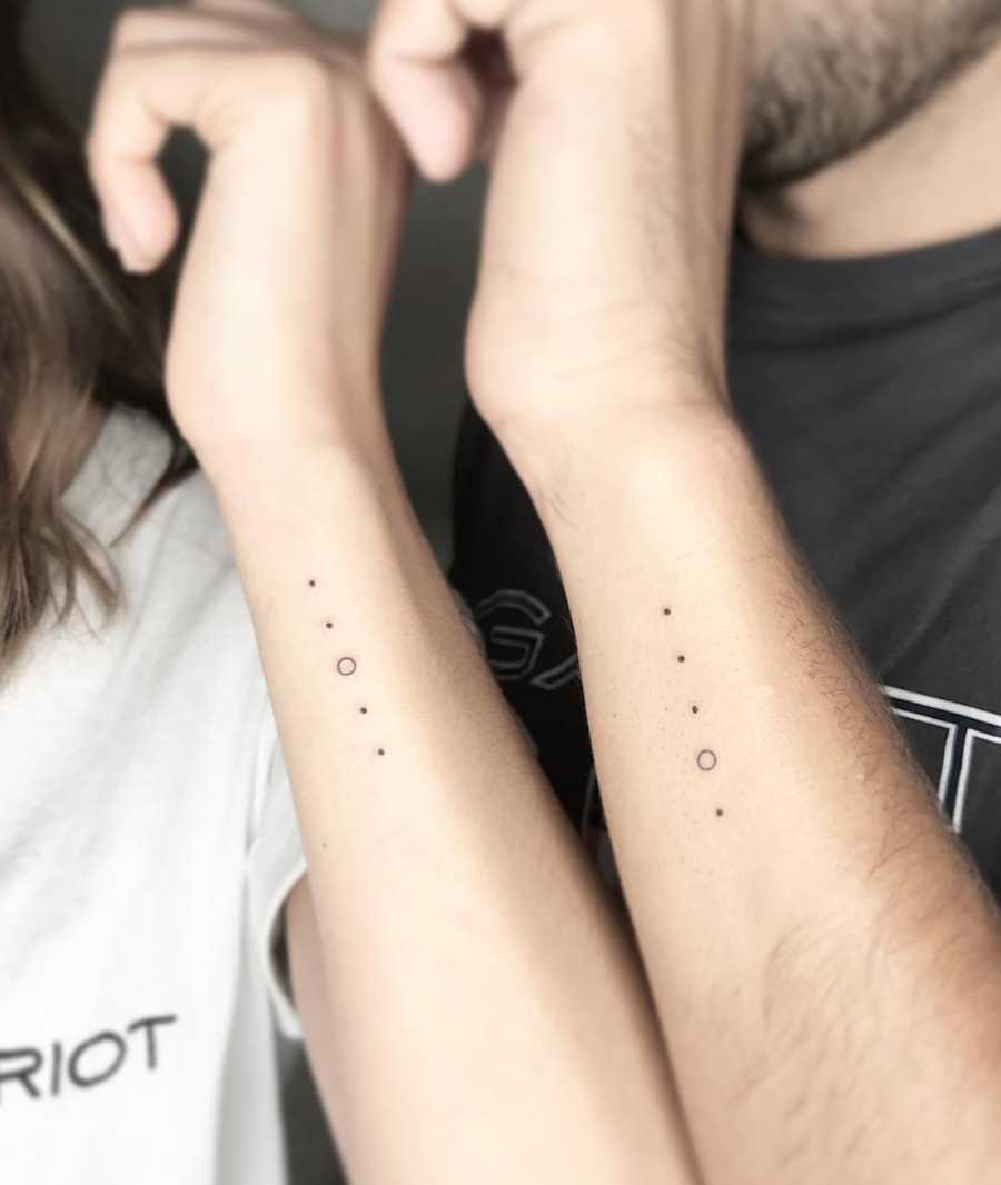 Mysterious Dot & Circles Friendship Tattoo Tattoo on skin