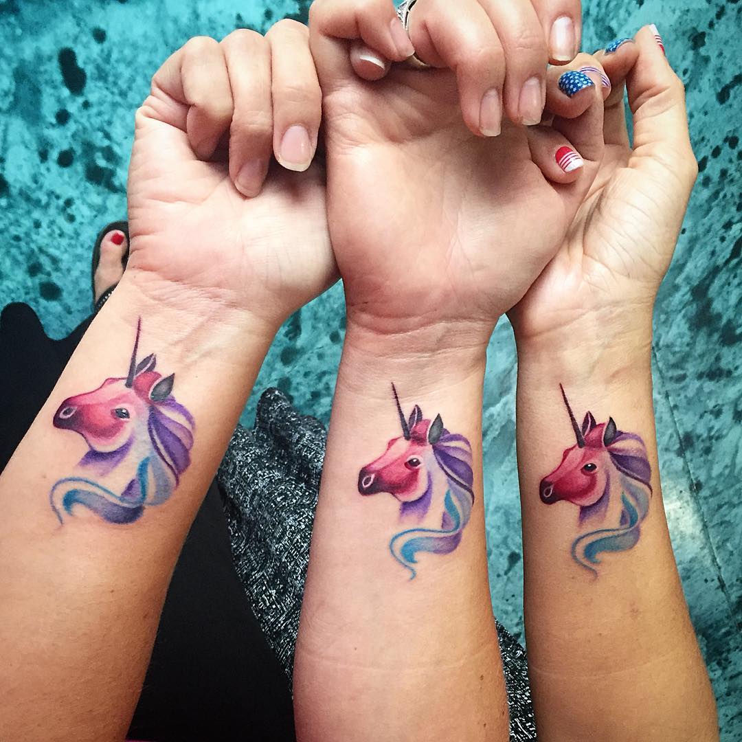 Mystical Unicorns in Magical Colors Tattoo on skin