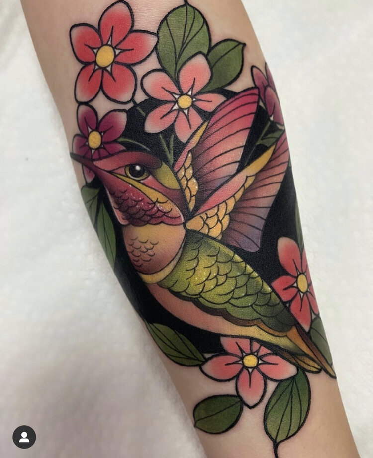 A Hummingbird with a Tropical Palette Tattoo Designs Tattoo on skin