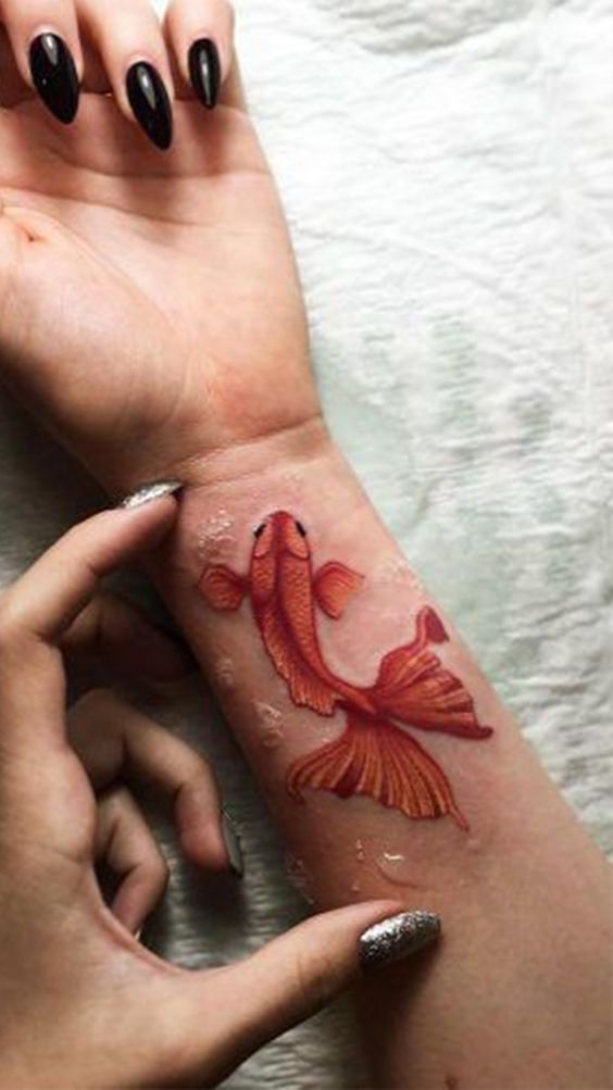 A Wrist Tattoo for Koi Girls Tattoo on skin