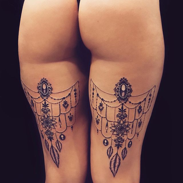 Garters Fit for a Queen Tattoo on skin