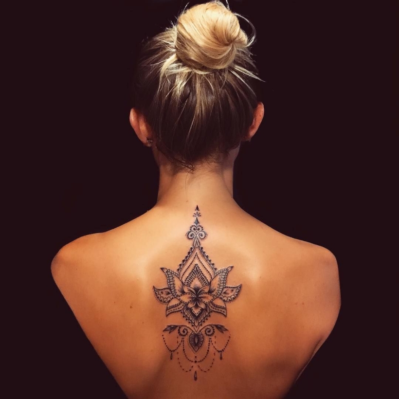 Persian Princess with a Bejeweled Back Tattoo on skin