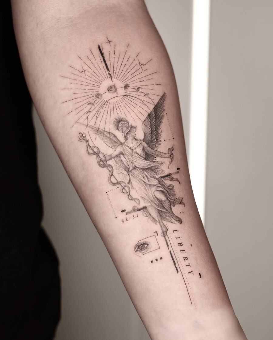 Elegant design featuring Liberty and celestial elements Tattoo on skin