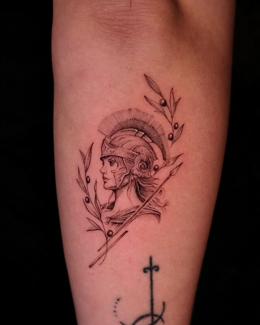 Intricate Athena tattoo with olive branches Tattoo on skin
