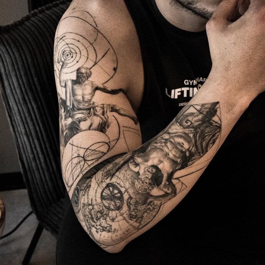 Intricate Greek gods tattoos on a muscular arm Tattoo on skin