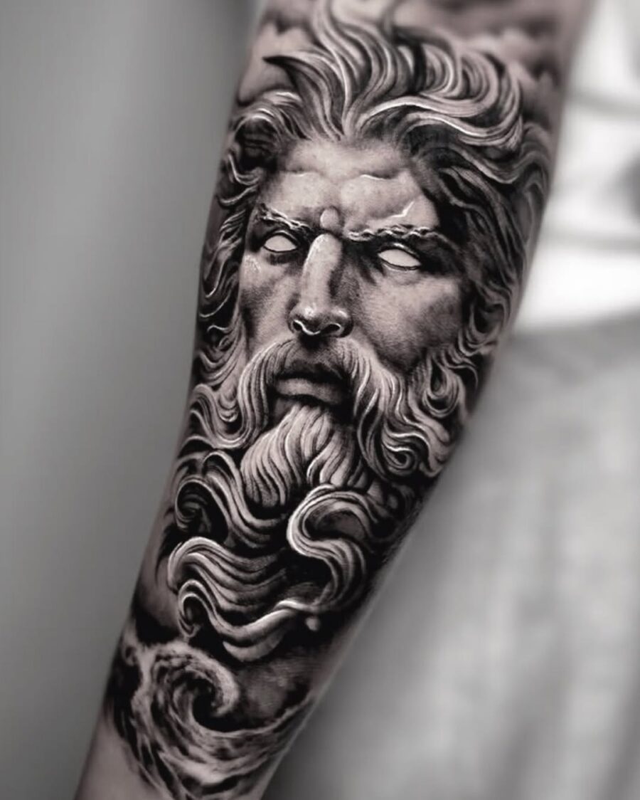 Intricate Zeus portrait tattoo with flowing details Tattoo on skin