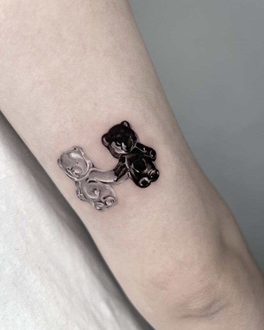 Charming black and white gummy bear duo tattoos Tattoo on skin