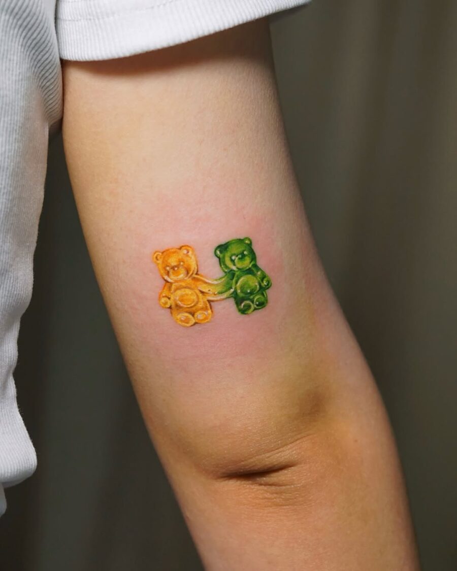 Charming gummy bears in vibrant colors unite. Tattoo on skin