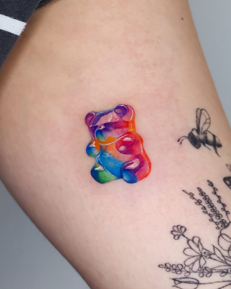 Colorful gummy bear tattoo exuding playfulness Tattoo on skin
