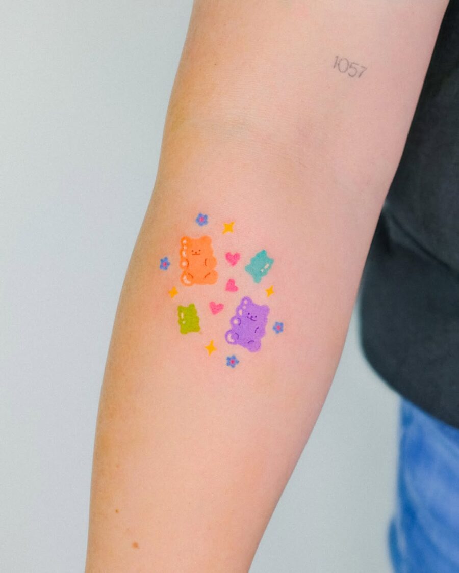 Colorful gummy bears in a playful arrangement Tattoo on skin
