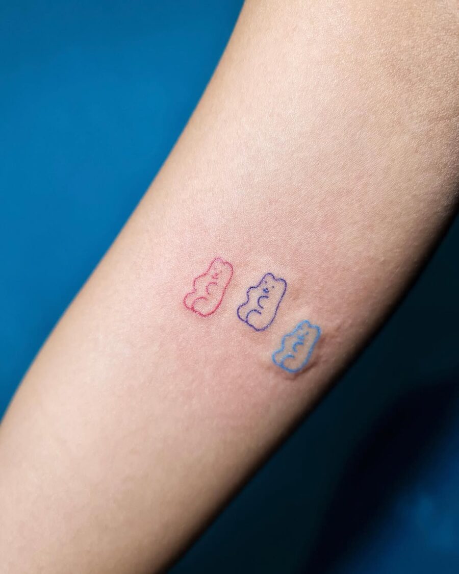 Cute gummy bear tattoo in playful colors Tattoo on skin